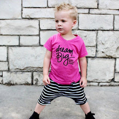 DREAM BIG AND WEAR PINK. Kids PINK graphic tee